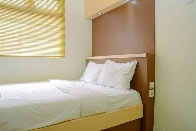 Fully Furnished and Cozy 2BR at Green Pramuka City Apartment - Öne Çıkan Resim