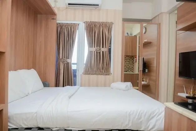 Functional Studio Green Pramuka Apartment near Shopping Center