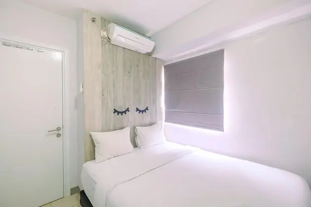 Furnished Green Pramuka 1BR Apartment with Modern Style and City View