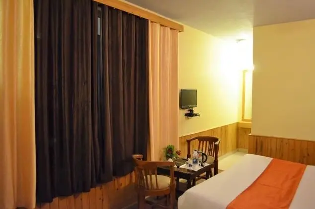Gezellig Inn Tree Hill Cottages & Kanyal Villas - Oda