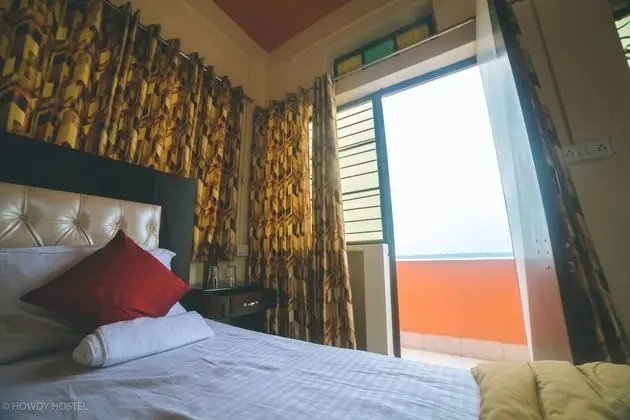 On The Ghat by Howdy Hostels