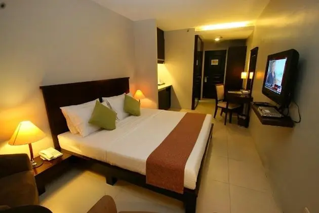 Goldland Millenia Suites - Oda