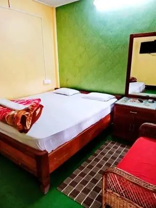 Goroomgo Green Gold Resort Lataguri - Oda