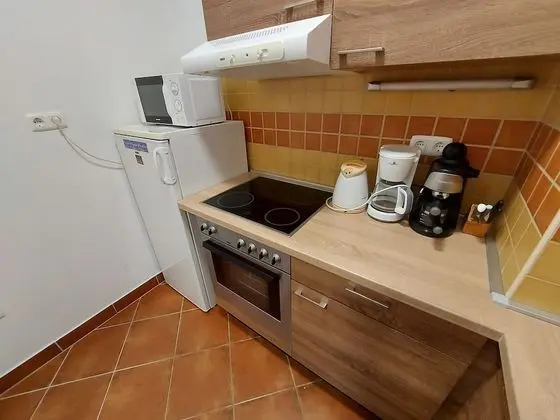 Gréta Wellness Apartmanok - Mutfak