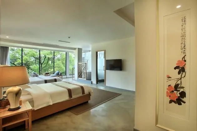 GuiLin HeShe Hotel - Oda