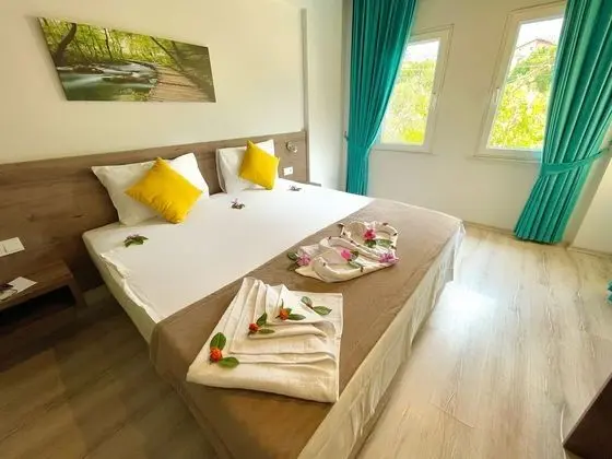 Gunes Hotel & Apartments - Oda