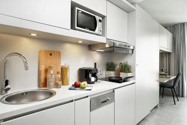H.ome Serviced Apartments München - Mutfak