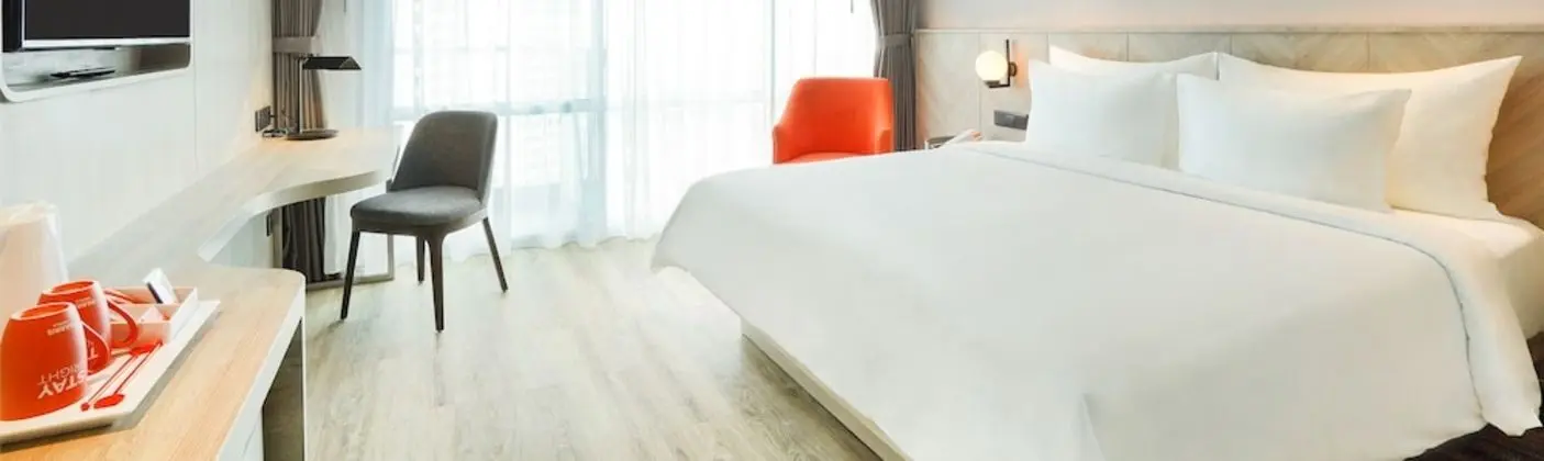 Harris Suite Puri Mansion - Oda
