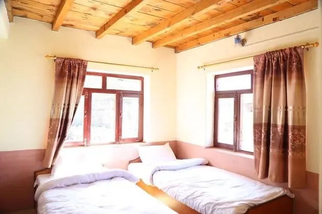 Hotel Himalayan Paradise - Oda