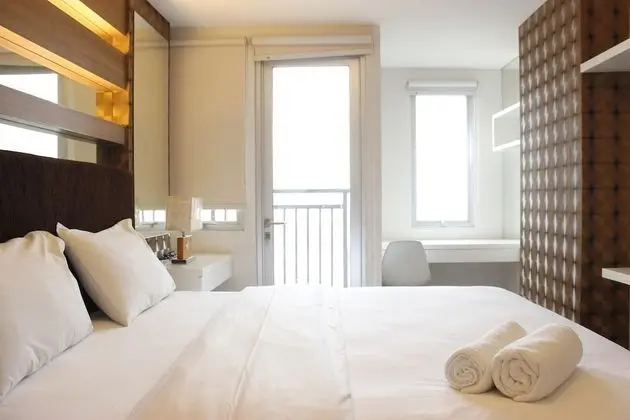 Homey 2BR Apartment at Sudirman Suite