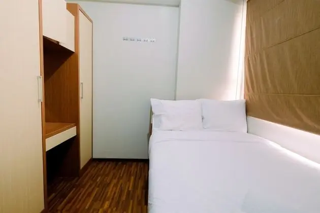 Homey 2BR at Menteng Square Apartment