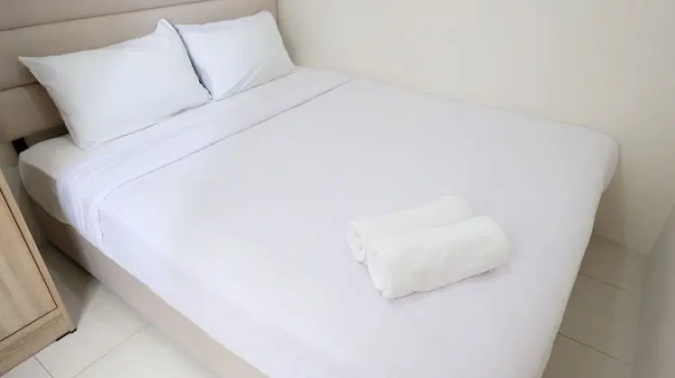 Homey 2Br At Puncak Permai Apartment