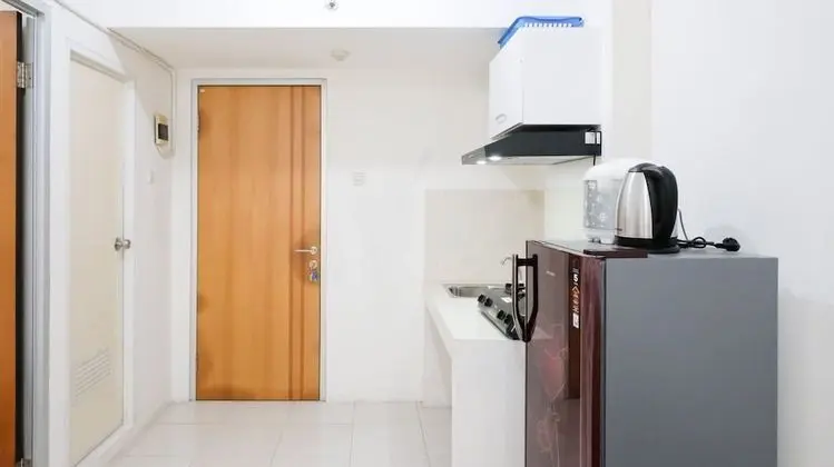 Homey 2Br At Puncak Permai Apartment - Mutfak