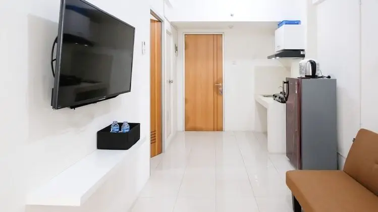 Homey 2Br At Puncak Permai Apartment - Oda Düzeni