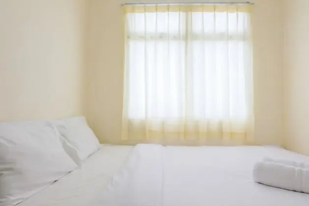 Homey 2BR at Serpong Greenview Apartment