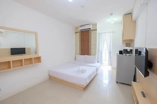 Homey and Comfort Living Studio Room at Bassura City Apartment