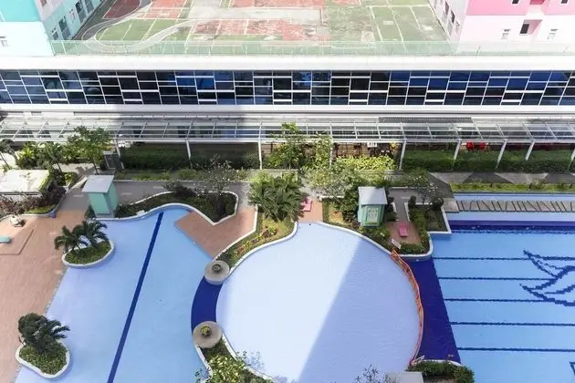 Homey and Comfy 2BR at Green Pramuka City Apartment