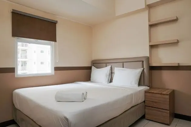 Homey and Compact 2BR Pluit Sea View Apartment