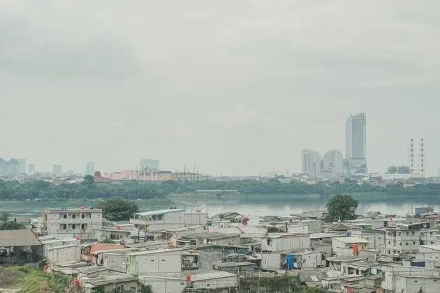 Homey and Compact 2BR Pluit Sea View Apartment