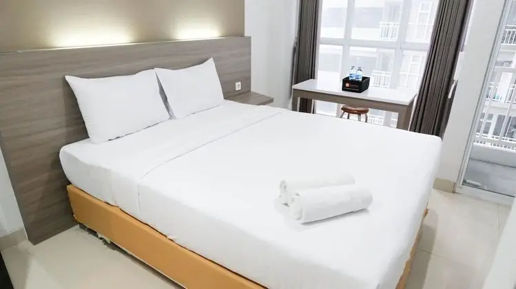 Homey And Compact Studio Apartment At Taman Melati Surabaya