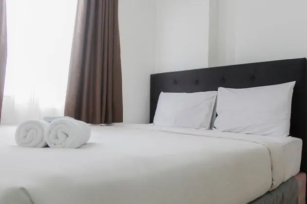 Homey and Cozy 2BR Bassura City Apartment near Mall