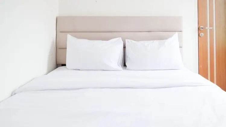 Homey And Cozy Living 2Br Apartment At Puncak Cbd