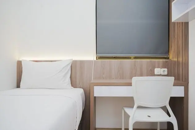 Homey And Cozy Living 2Br At Sky House Bsd Apartment - Oda