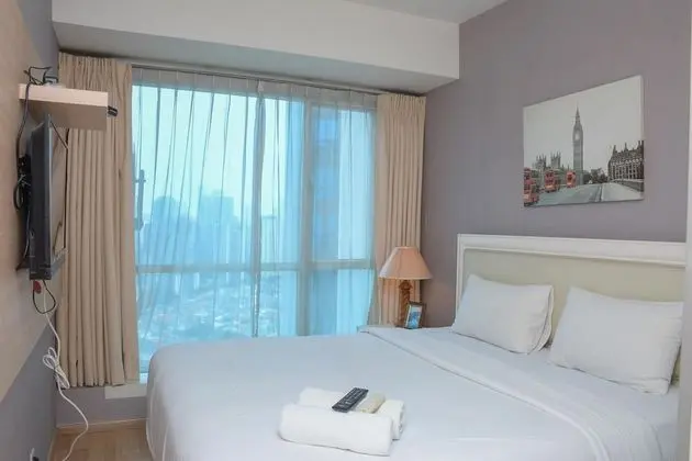 Homey And Cozy Stay 2Br At Casa Grande Apartment
