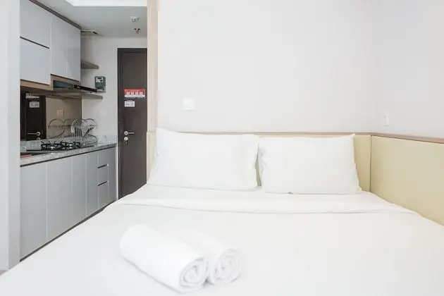 Homey and Cozy Studio Casa De Parco Apartement - Oda