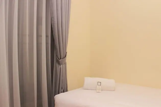 Homey Living 2Br At Meikarta Apartment
