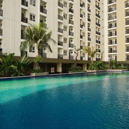 Homey and Modern with City View 2BR Poins Square Apartment
