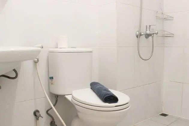 Homey And Nice 2Br At Patraland Urbano Apartment