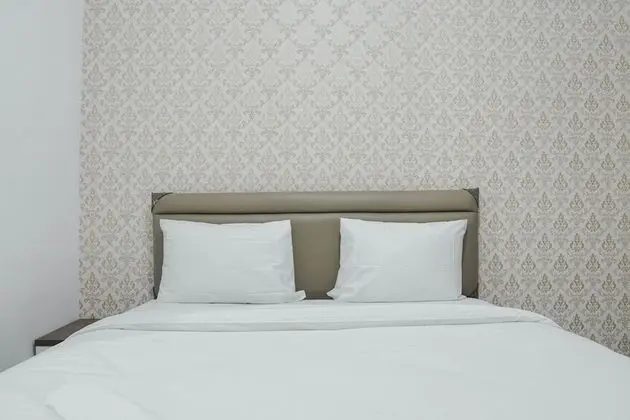 Homey and Nice Studio Apartment at Scientia Residence