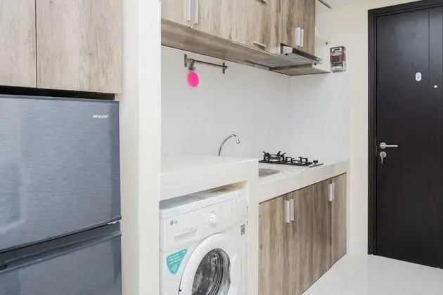 Homey And Simply Studio At Casa De Parco Apartment - Mutfak