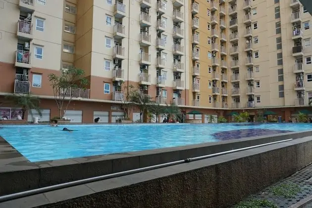 Homey Studio Apartment At Green Palm Residence