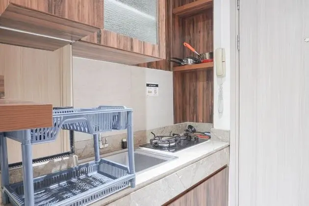 Homey And Tidy Studio Apartment Elpis Residence - Mutfak