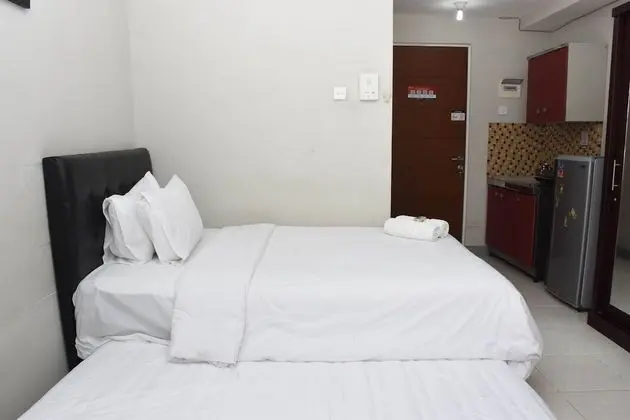 Homey And Tidy Studio Taman Melati Margonda Apartment Near Campus