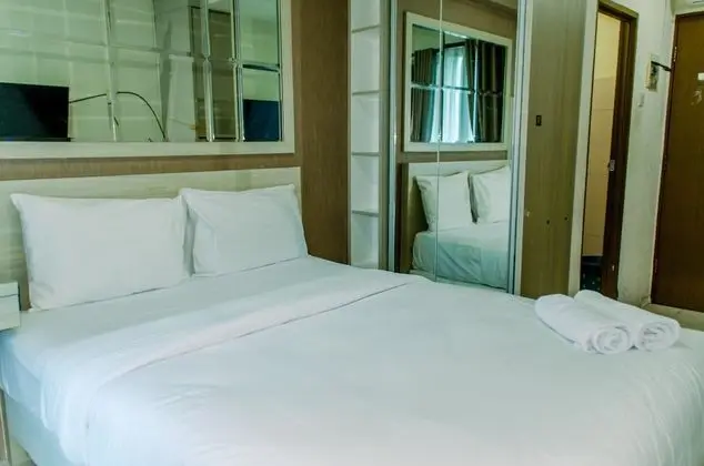 Homey And Warm Studio Room At Tifolia Apartment