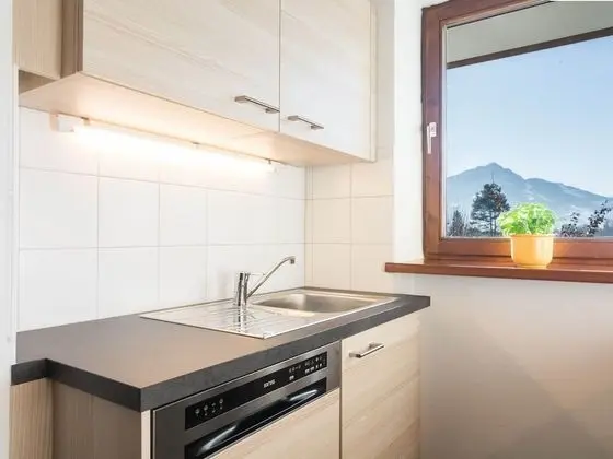 Inviting Chalet in Kirchdorf in Tirol near City Center - Mutfak