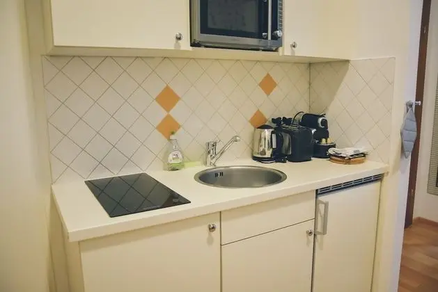 JL Apartments - Mutfak