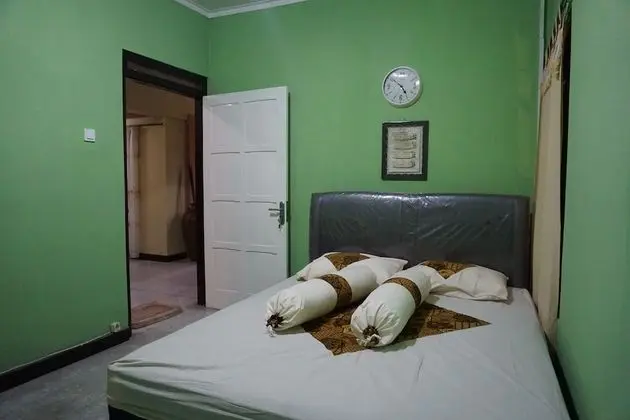 Kanti Kinasih Homestay by The Grand Java - Oda