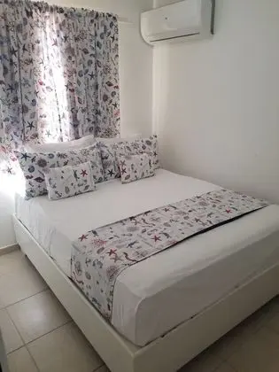 Karimar Beach Condo Hotel - Oda