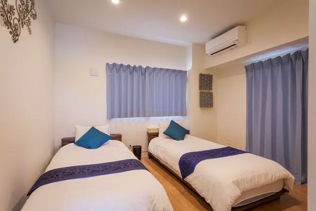 Kariyushi Condominium Resort Chatan ARAHA BLUE RESORT - Oda
