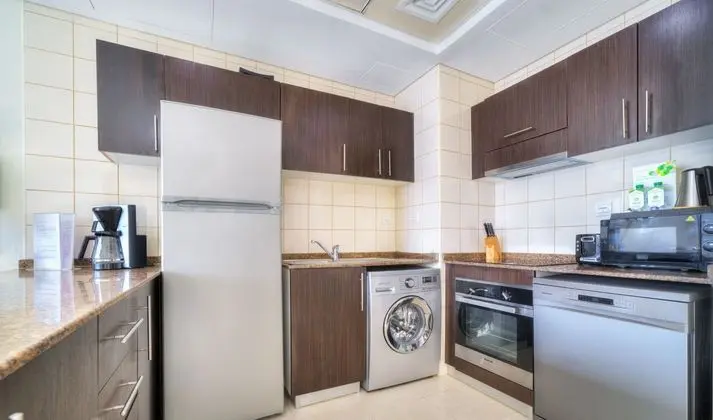 KOHH – 1BR in Bay Central - Mutfak