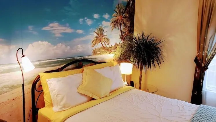 Kokomo Inn - Tropical Riverfront B&B - Oda