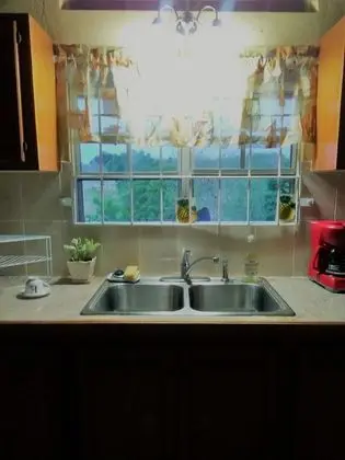 La Casa de Joy Airport Apartments - Mutfak