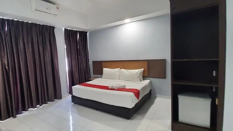 Leisure Cove Hotel & Apartments - Oda