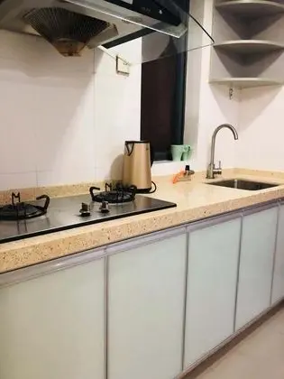 Leju 68 Apartment Hotel - Mutfak