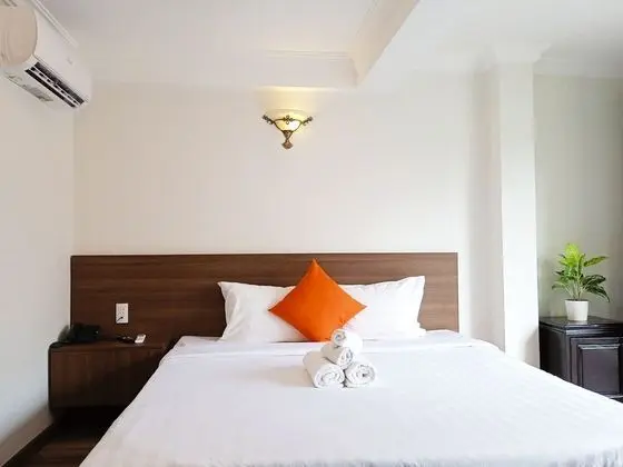 L'Harmonie Hotel in Ben Thanh Market - Oda