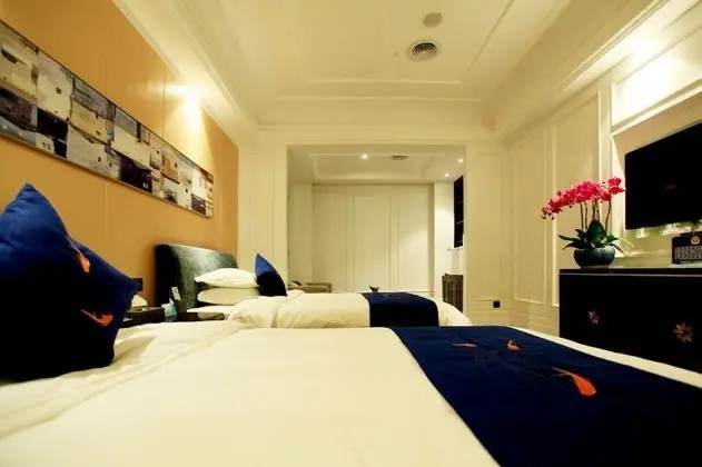 Liangchen Meijing Hotel - Oda